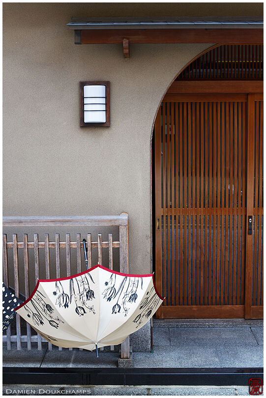 Drying umbrellas in front of a house in Gion (祇園)