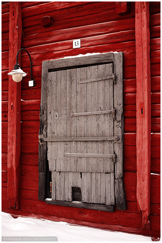 Old wooden red facade on Oulu harbour