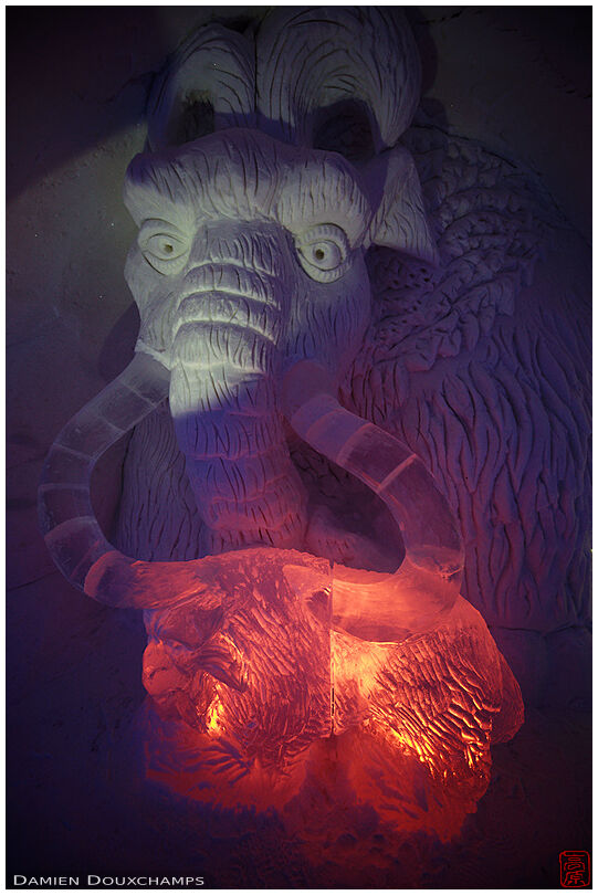 Ice sculpture of a mammoth with red lights, Kemi Snow Castle, Finland