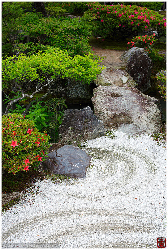 Small zen garden with stone bridge in Ginkaku-ji temple