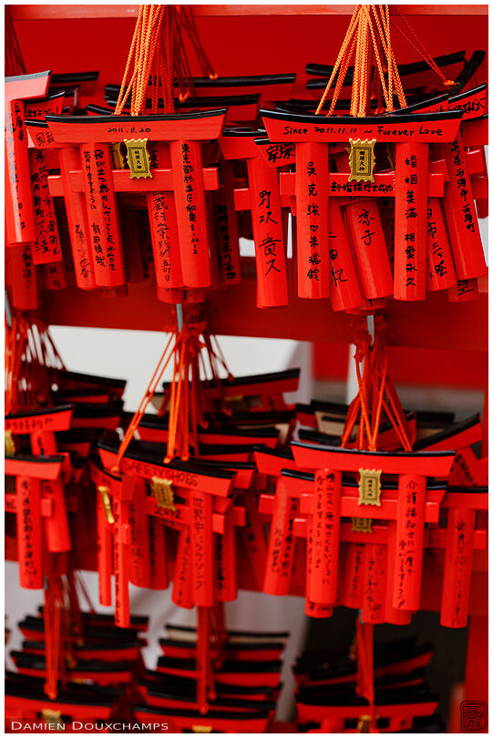 Red torii as votive offerings in Fushimi Inari Taisha