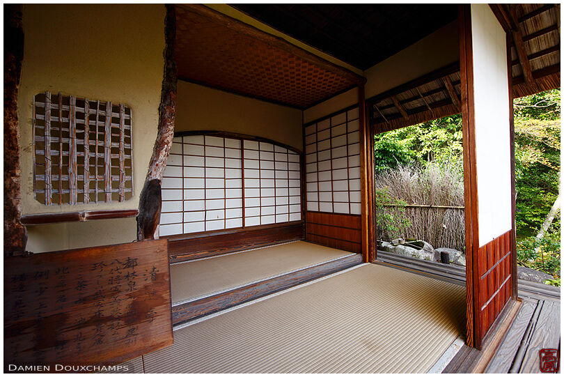 Tsukubai hiding behind a very old tea house in Toji-in temple, Kyoto, Japan