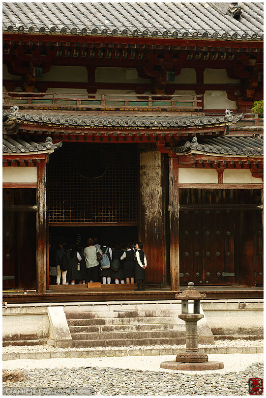 Tourists visiting Byodo-in temple before its restoration, Kyoto, Japan