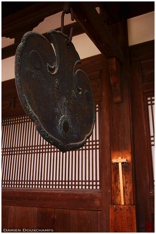 Metallic gong and wooden hammer, Manpuku-ji temple, Kyoto, Japan