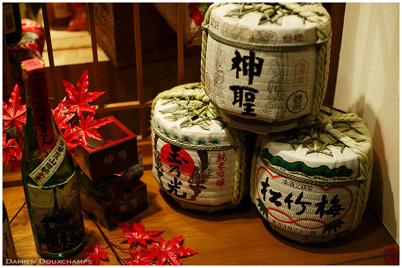 Miniature sake barrels in a shop window, Kyoto, Japan