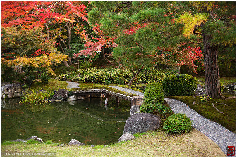 Small bridge over pond in autumn, Seifu-so villa, Kyoto, Japan