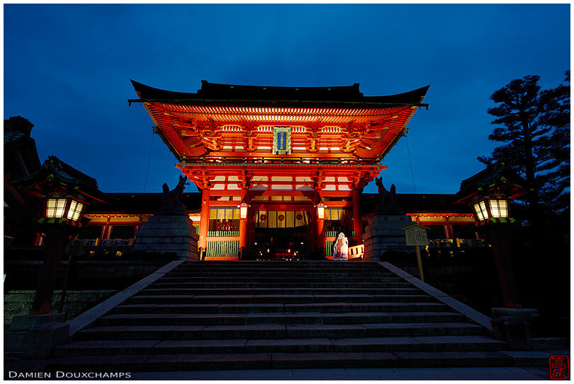 Fushimi Inari shrine entrance gate at dusk, Kyoto, Japan