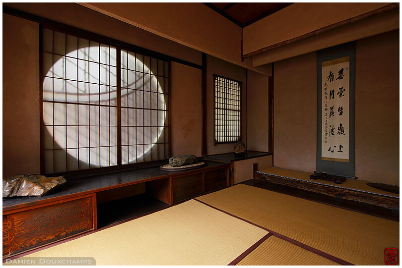 Typical sukiya architecture room with round window in Komyo-in temple, Kyoto, Japan