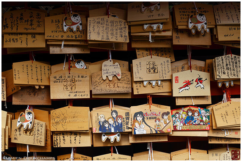Ema votive offerings painted in the theme of the K-ON anime series, Imamiya shrine, Kyoto, Japan