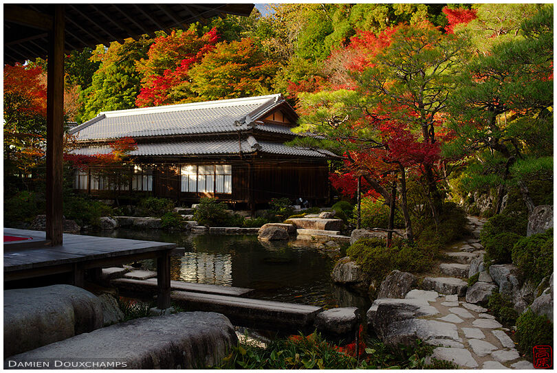 Last light on Hyakusai-ji temple and its pond in autumn, Shiga, Japan