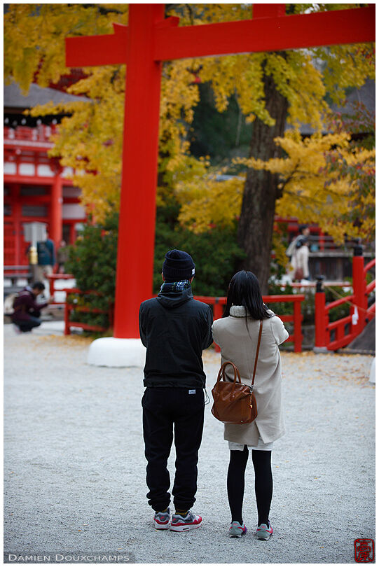 Couple on the grounds of Shimogamo-jinja shrine, Kyoto, Japan