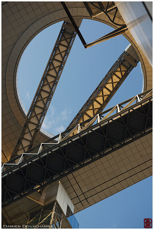 Complex modern architecture of Umeda Sky building and its central round hole, Osaka, Japan