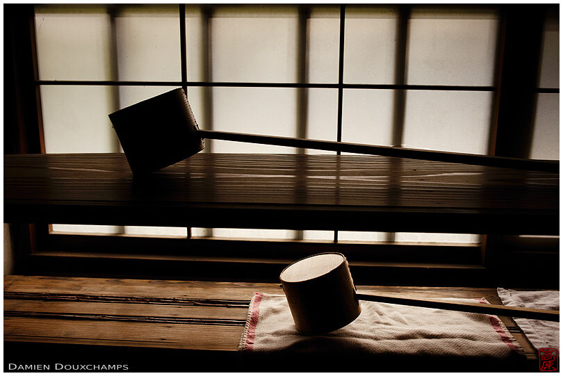Two ladles drying on wooden shelves in a tea room of Shodensan-so, Kyoto, Japan