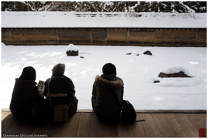 Thick snow cover on Ryoan-ji's famous rock garden, Kyoto, Japan