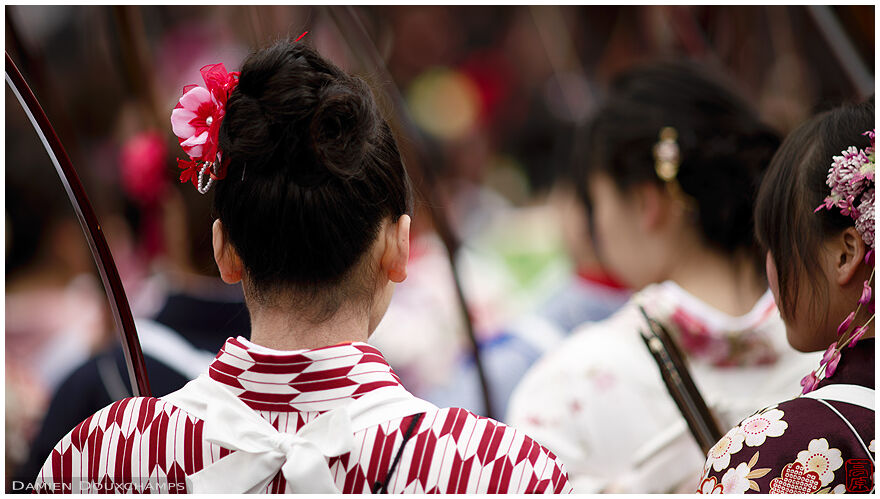 Female archers in kimono during the Toshiya event in Sanjusangen-do temple, Kyoto, Japan