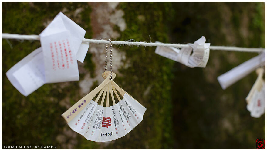 Discarded fan-shaped fortune, Muro-ji temple, Kyoto, Japan