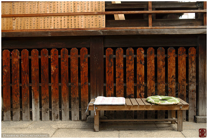 Bench with cushions in the local city temple of Byodo-ji, Kyoto, Japan