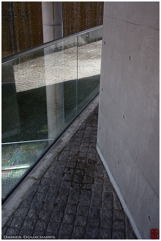 Glass, concrete and stone architectural detail in the Tadao Ando designed Garden of Fine Arts, Kyoto, Japan