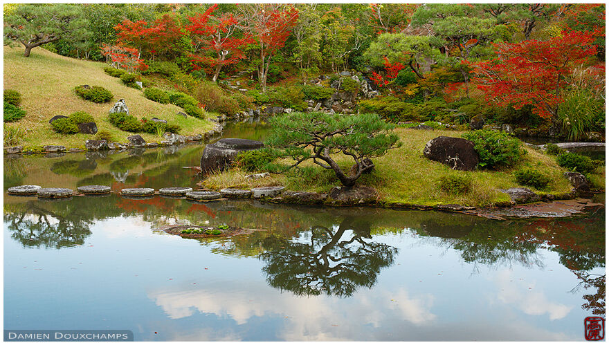 Autumn foliage and reflections in the pond garden of Isui-en, Nara, Japan