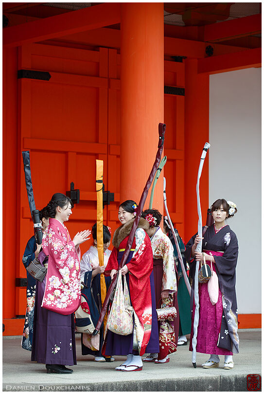 Yound ladies wearing kimonos after archery competition, Sanjusangen-do temple, Kyoto, Japan