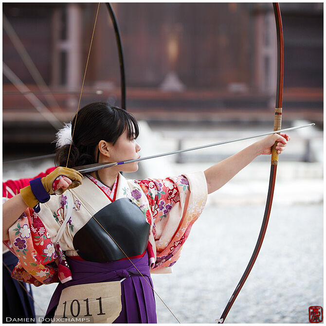 Young female archer in kimono during the Toshiya archery competition in Sanjusangendo temple, Kyoto, Japan