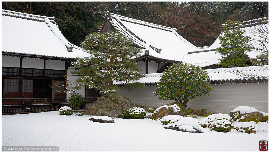 Zen garden disappearing under snow cover, Nanzen-ji temple, Kyoto, Japan