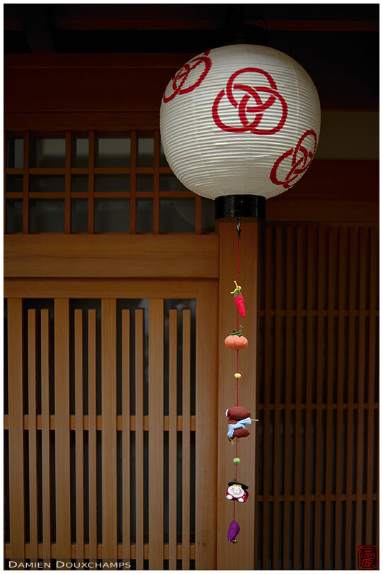 Paper lantern with string of cute little items in Miyagawa-cho, Kyoto, Japan
