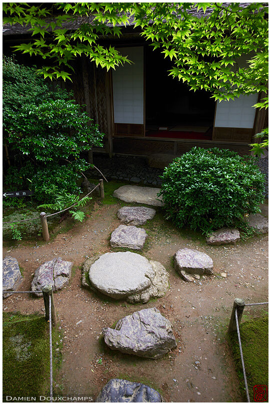 Stepping stones in front of a tea house of the Okochi-sanso villa's gardens, Kyoto, Japan
