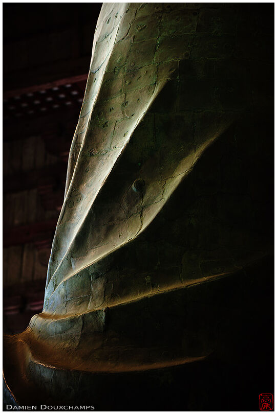 Detail of the massive Buddha statue in Todai-ji temple hall, Nara, Japan