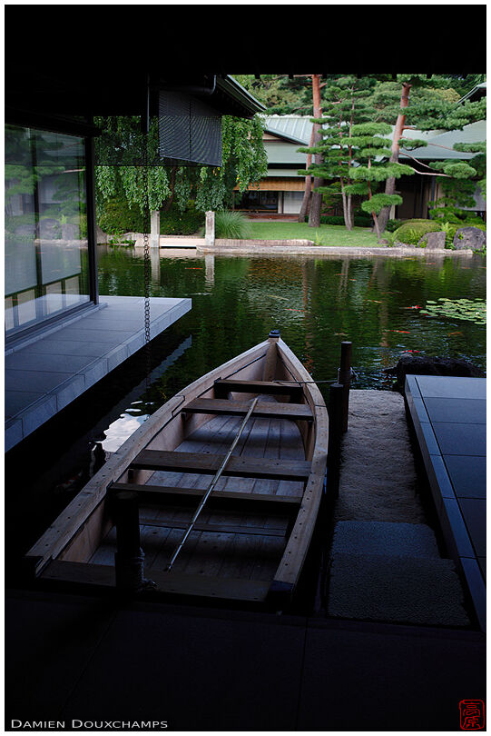 Row boat on the pond of the State Guest House, Kyoto, Japan