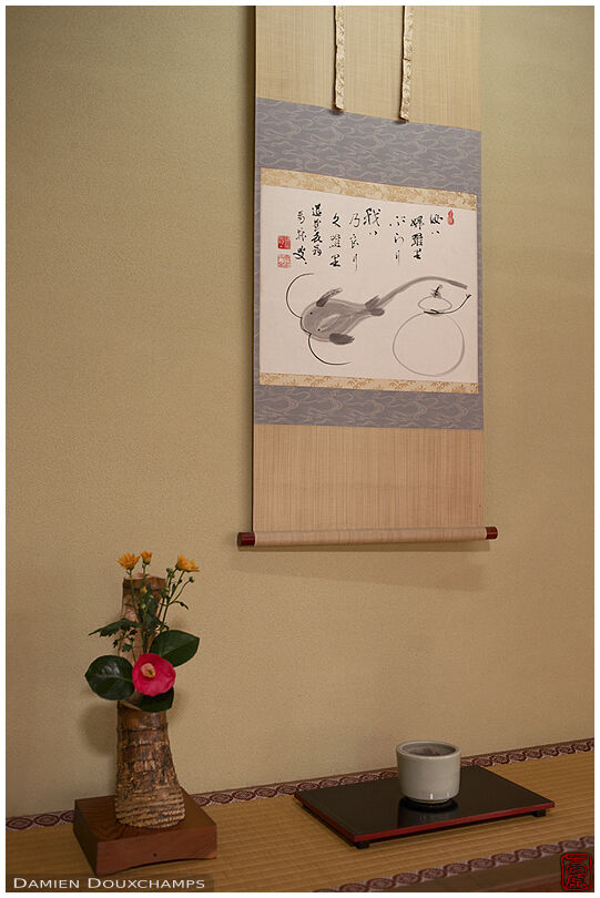 Hanging scroll and ikebana in a tea room of Taizo-in temple, Kyoto, Japan