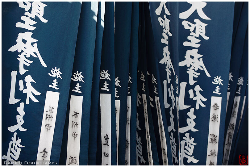 Numerous blue flags in Marishisonten-dō temple, Kyoto, Japan