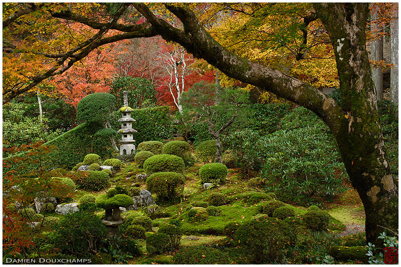 Stone pagoda in autumn garden, Sanzen-in temple, Kyoto, Japan
