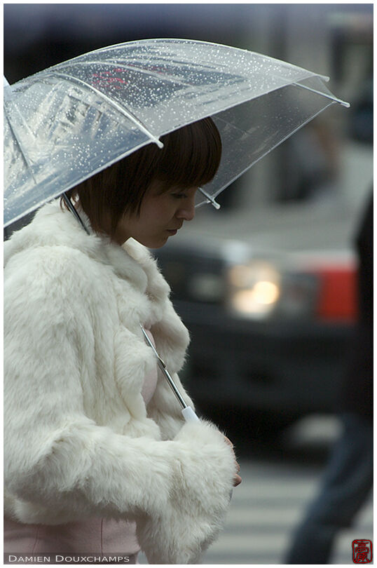 Sad girl with umbrella