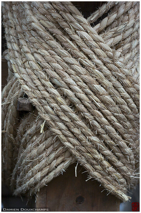 A knot tying two beams together