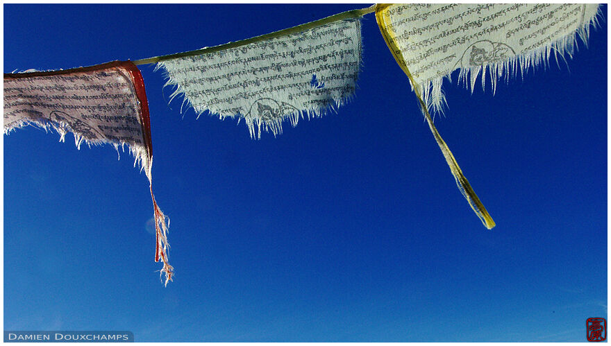 Buddhist prayers over the mountainous horizon