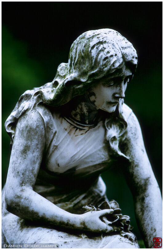 A sad statue in the Laeken Cemetery