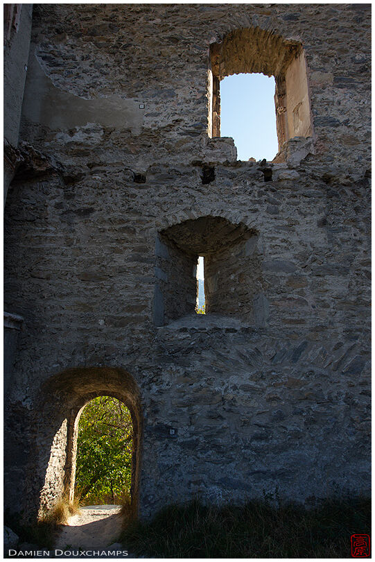 Doors and windows in the ruins of the Chateau de Tourbillon