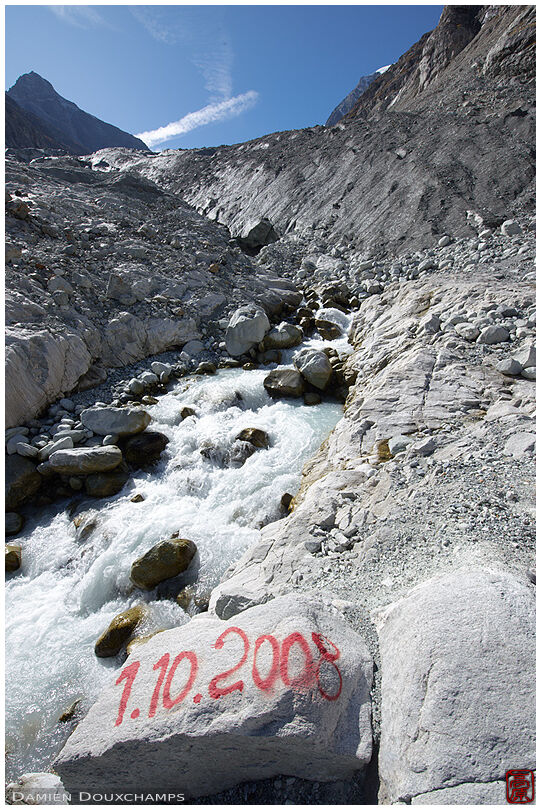 Date painted on rock to estimate the retreat rate of a glacier