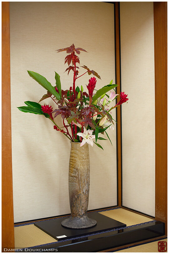 Large standing vase and ikebana