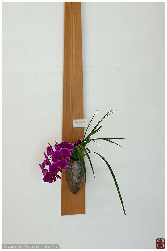 Small hanging vase and ikebana