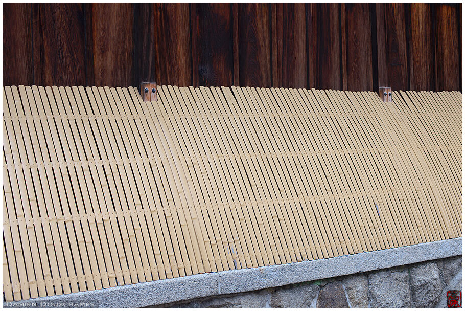 Traditional Japanese facade with bamboo cover