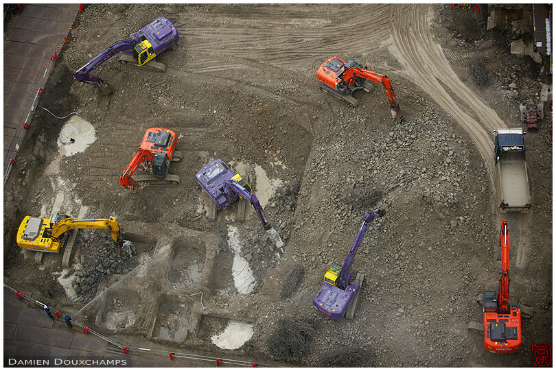 Ballet for seven excavators and a truck