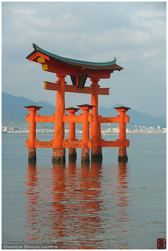 Itsukushima shine's torii with Hiroshima in the distance