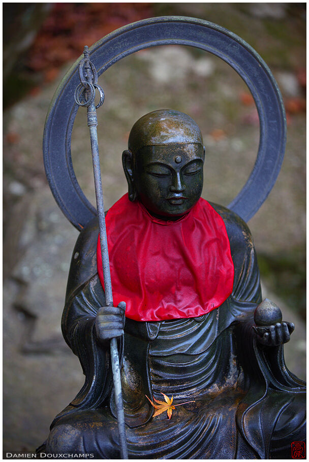 Dark metallic buddha statue