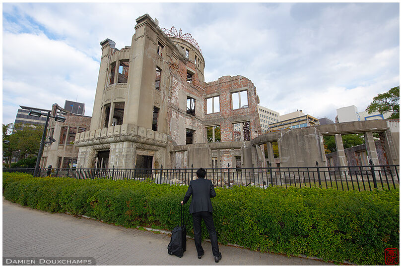 Businessman in front of the A-Bomb Dome