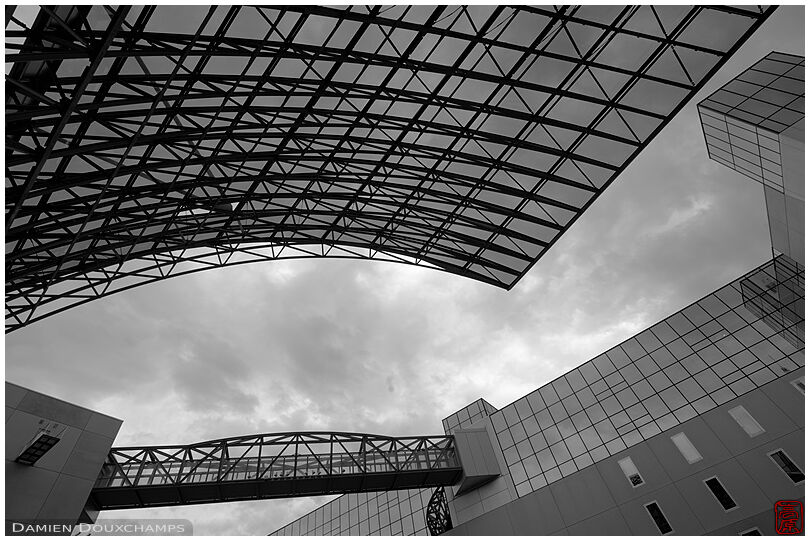 Walls, roofs and bridges filling the frame, Kyoto station, Japan