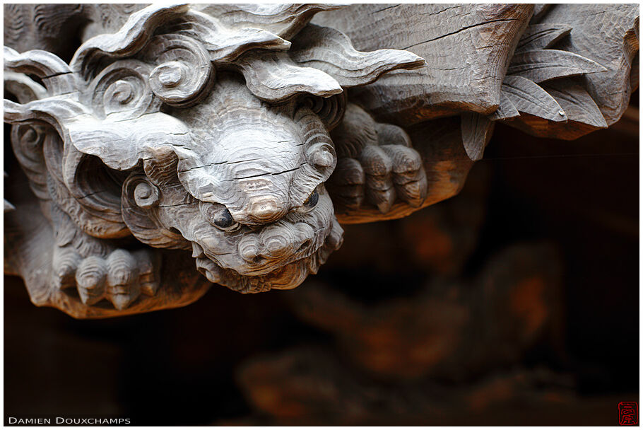 Wooden demon sculpture on temple roof (Koyasan 高野山)