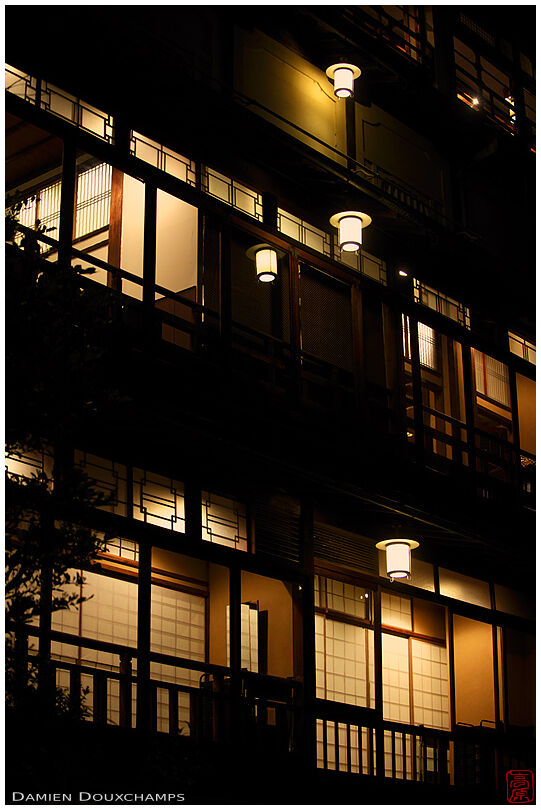 Traditional hotel facade at night