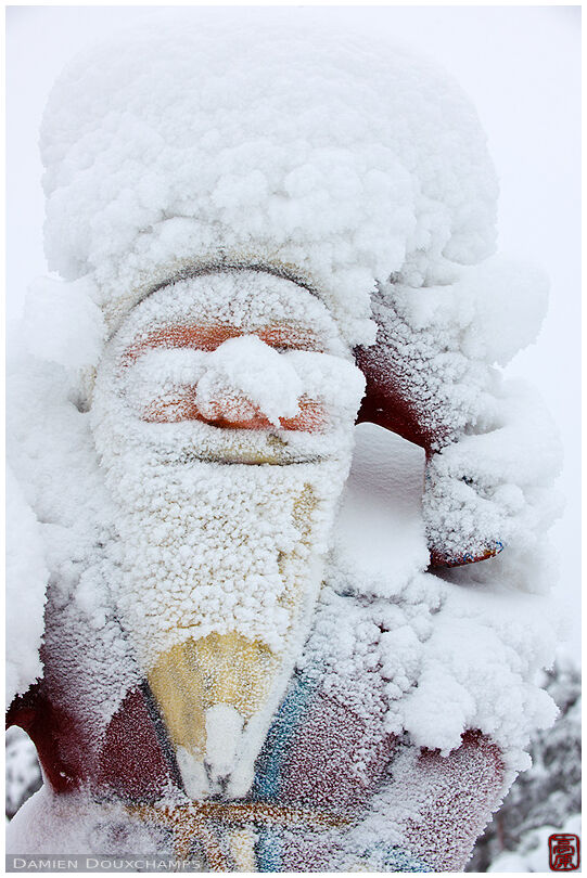 Frost-covered Santa Claus statue in Rovaniemi